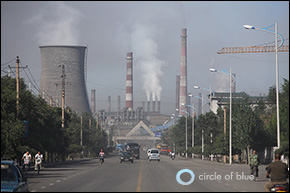 The smoke stacks of the Baosteel Complex dominate the skyline of Baotou, Inner Mongolia. The anchor of the city’s economy, the iron and steel giant has historically dumped much of its wastewater into the Yellow River. Click image to enlarge. The smoke stacks of the Baosteel Complex dominate the skyline of Baotou, Inner Mongolia. The anchor of the city’s economy, the iron and steel giant has historically dumped much of its wastewater into the Yellow River. Click image to enlarge.