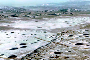 The Yucca Flat area of the Nevada Test Site is scarred with subsidence craters from underground nuclear testing