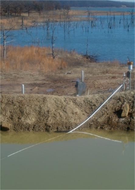 Produced water brine pit in Oklahoma oil and gas field.