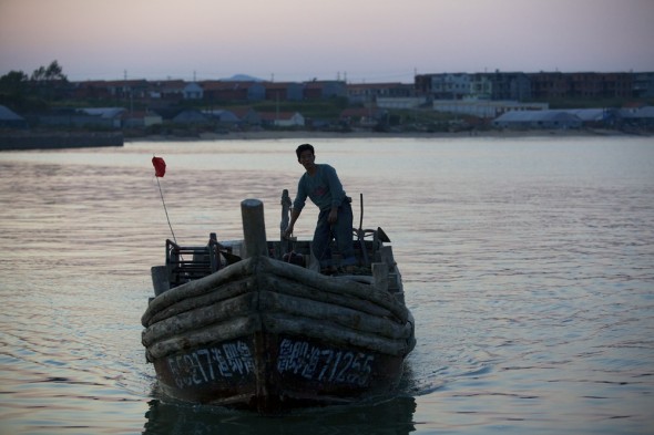 Click to enlarge. china aquaculture shandong aoshawei bay quindao dawn morning fishing boat