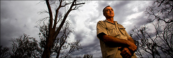 Once a farmer now a conservationist, Greg Ogle stands among Australia's giant red gum trees northwest of Swan Hill that the epic drought has killed. Use left and right arrows to navigate through all images.