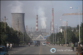 The smoke stacks of the Baosteel Complex dominate the skyline of Baotou, Inner Mongolia. The anchor of the city’s economy, the iron and steel giant has historically dumped much of its wastewater into the Yellow River. Click image to enlarge.