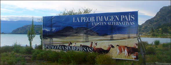 In Puerto Rio Tranquilo, a town along the General Carrera Lake, a billboard by the Patagonia Sin Represas organization features an image of Patagonian landscape with photoshopped-in electric tower reading “The worst image for the country: alternatives exist. Patagonia Without Dams!