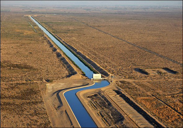 The All-American Canal, the main water conduit from the Colorado River into the Imperial Dam, flows through the Imperial Valley, Calif.  The U.S. consumes about 100 billion gallons of water a day. Nearly 85 percent is used for crop and livestock production. Of the 16.1 billion gallons that remain, half is devoted to producing energy.