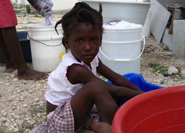 Haiti cholera earthquake health disease epidemic outbreak tent camp water sanitation latrine