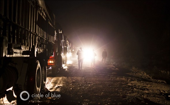 Thousands of trucks haul coal 24 hours a day from the mines outside Baotou, Inner Mongolia. In China, more than 1 billion metric tons of coal a year is shipped by truck. Photo copyright Toby Smith, Reportage by Getty Images
