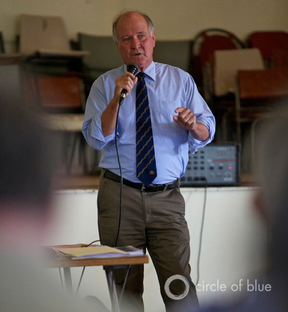 Tony Windsor, Independent Federal Member in the Parliament of Australia and a Liverpool Plains resident, addresses farmers at a town hall meeting on coal seam gas in Mullaley, New South Wales. Windsor initiated an upcoming scientific study of the cumulative effects of coal mining and coal seam gas operations in the area.