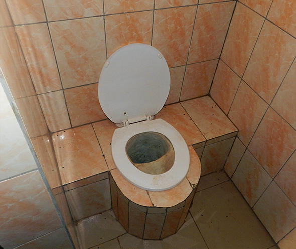 Rudahunga Alexis Valentin Ned Breslin kigali rwanda water for people wash sanitation public toilet latrine handicap accessible
