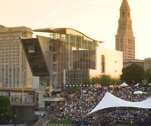 The Hartford, Connecticut riverfront, once polluted and unappealing, now draws nearly a million visitors each year. A riverside plaza, shown here, hosts concerts and festivals and is connected to downtown by a promenade over Interstate 91.