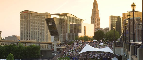 The Hartford, Connecticut riverfront, once polluted and unappealing, now draws nearly a million visitors each year. A riverside plaza, shown here, hosts concerts and festivals and is connected to downtown by a promenade over Interstate 91.