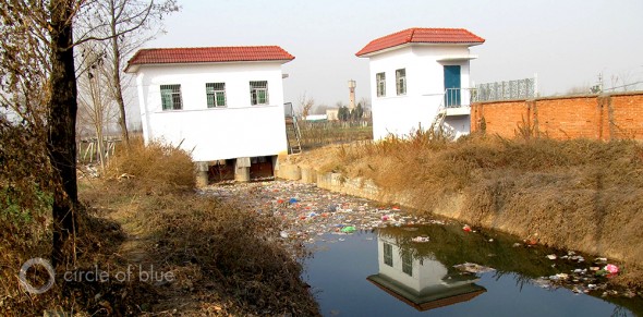 water pollution contamination china xian shanxi province pesticide plastic bottle irrigation canal agriculture