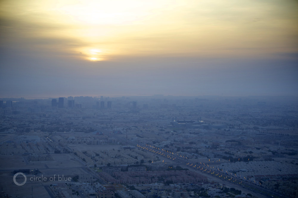 Qatar Doha suburbs sunrise fossil fuel wealth water scarce