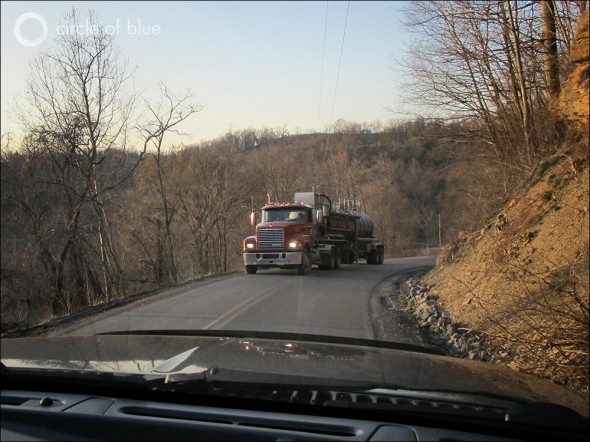 Water tankers hauling fracking fluids and wastewater from a shale gas drilling site in the hills along the Ohio River near Parkersburg, W. Va.