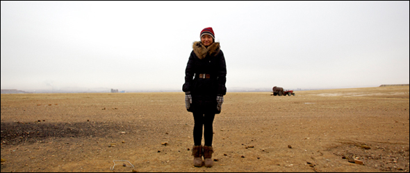 Two years ago, on a frigid December afternoon, Wu Yun stood outside her parents' farmstead near Xilinhot with tailing piles from the coal mines in the distance.