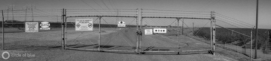 Gates block access to the California Aqueduct as it flows through the Central Valley.