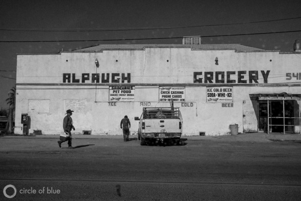 Pedestrians in Alpaugh, a small farmworker town in the Central Valley.