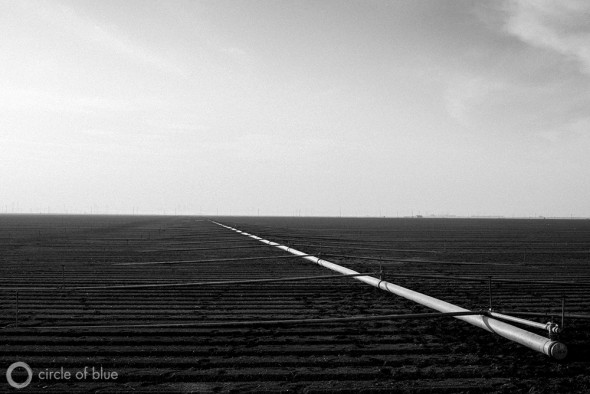 Irrigation pipes in the Westlands Water District, home to some of California's largest farms. Growers in the area have seen their water supply cut in recent years, leading for calls to construct a new tunnel system to deliver more water from the California Delta.