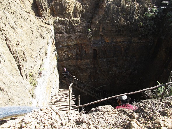 Thousands of deep and dangerous box coal mines like this one in the Jiantia Hills pour pollution into the water and cause mining deaths and injuries.