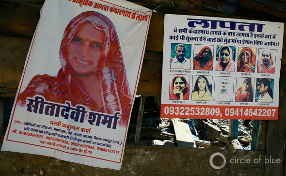 Posters of missing Hindu pilgrims are grim ornaments on the walls of buildings that still stand in Sonprayag, downriver on the Mandkini River from the Kedarnath temple. The Uttarakhand government counts almost 600 bodies recovered after the flood and more than 5,000 missing. Residents of the region and a researcher at the Wadia Institute of Himalayan Geology assert that 30,000 people perished in the June flood. Photo: Dhruv Malhotra