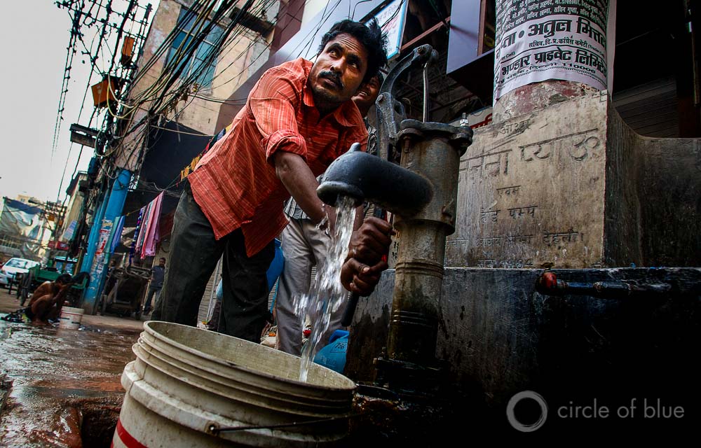 Delhi India water access sanitation slum World Economic Forum global risks report J. Carl Ganter Circle of Blue