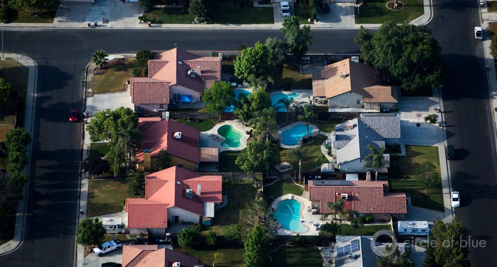 California Bakersfield pool lawn backyard aerial shot suburb urban water use