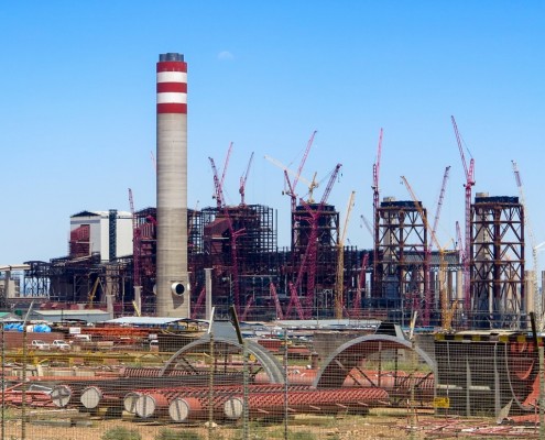 The 4,800-megawatt Kusile coal-fired generating station east of Johannesburg, years overdue and billions of dollars over budget, is at the center of the damaging economic, social, and ecological vortex engulfing South Africa. Photo © Keith Schneider / Circle of Blue.