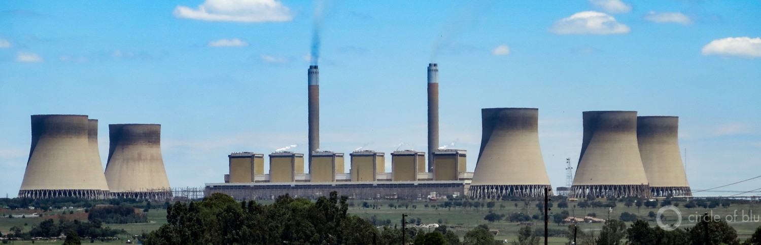 The 4,116-megawatt Kendal coal-fired generating station in Mpumalanga province, South Africa's central coal mining and coal-generating region, went into full commercial operation in 1988 and is visible from the site of the Kusile plant. Photo © Keith Schneider / Circle of Blue.