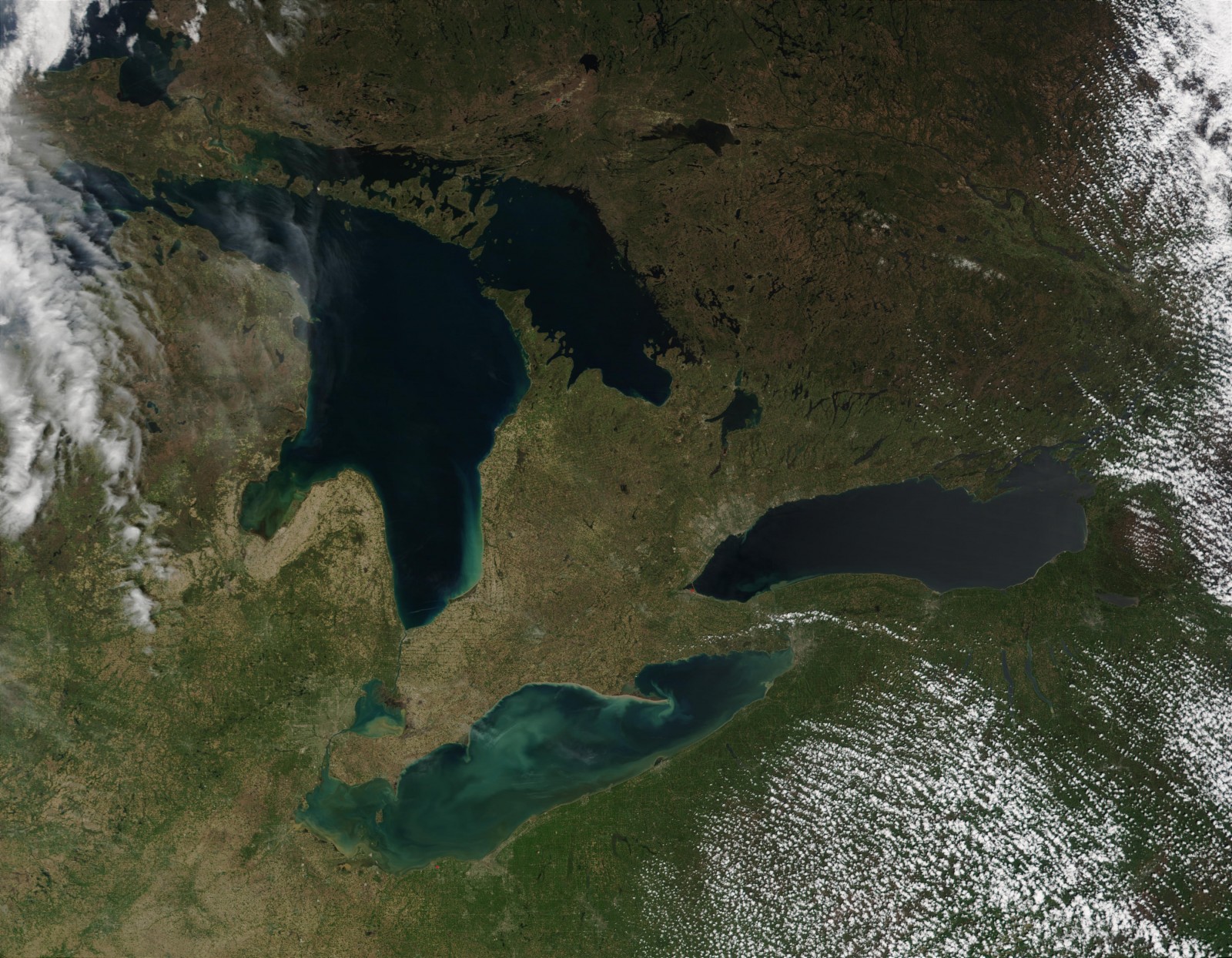 The nine aquaculture facilities in the Ontario waters of Lake Huron are the only fish farms operating in the Great Lakes. Photo courtesy MODIS / NOAA Great Lakes Environmental Research Laboratory via Flickr Creative Commons