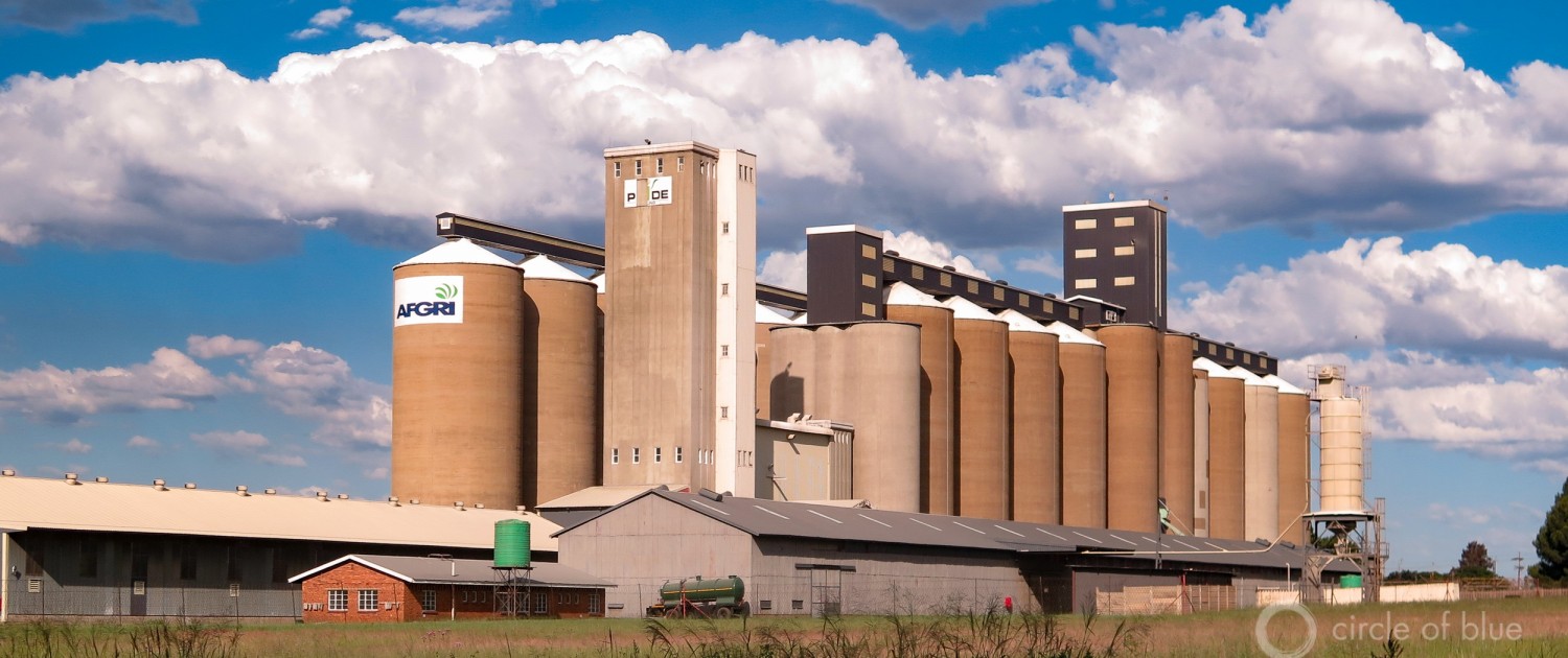 Grain elevators rise above farm fields in Mpumalanga province, in northeastern South Africa. Africa's largest grain producer will import maize this year due to the worst drought in more than three decades. Photo © Keith Schneider / Circle of Blue