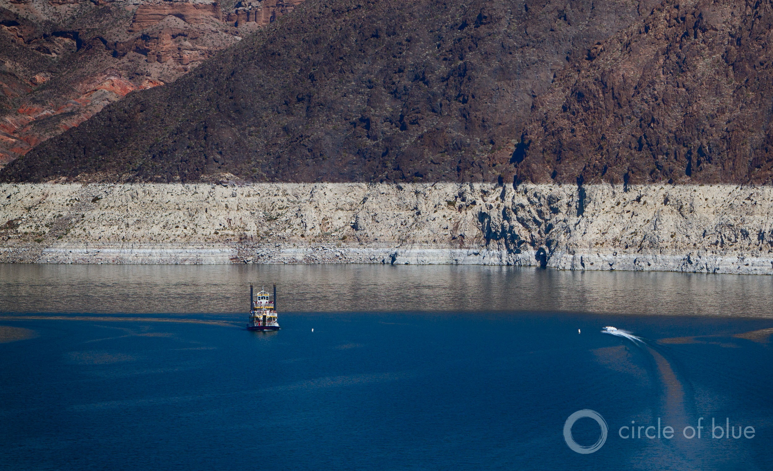 Lake Mead set a new record low on May 18, but the states that draw water from the big reservoir will not face mandatory restrictions in 2017. Water levels are not projected to drop low enough to trigger a first-ever shortage. Photo © J. Carl Ganter / Circle of Blue