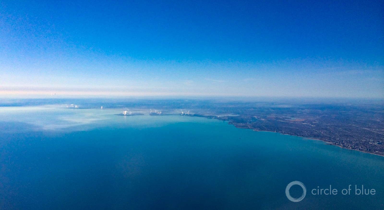 The city of Waukesha, Wisconsin, located just outside of the Great Lakes Basin, is asking to divert Lake Michigan water for its municipal supplies. The governors of eight Great Lakes states will vote on the proposal Tuesday in Chicago, shown here. Photo © J. Carl Ganter / Circle of Blue