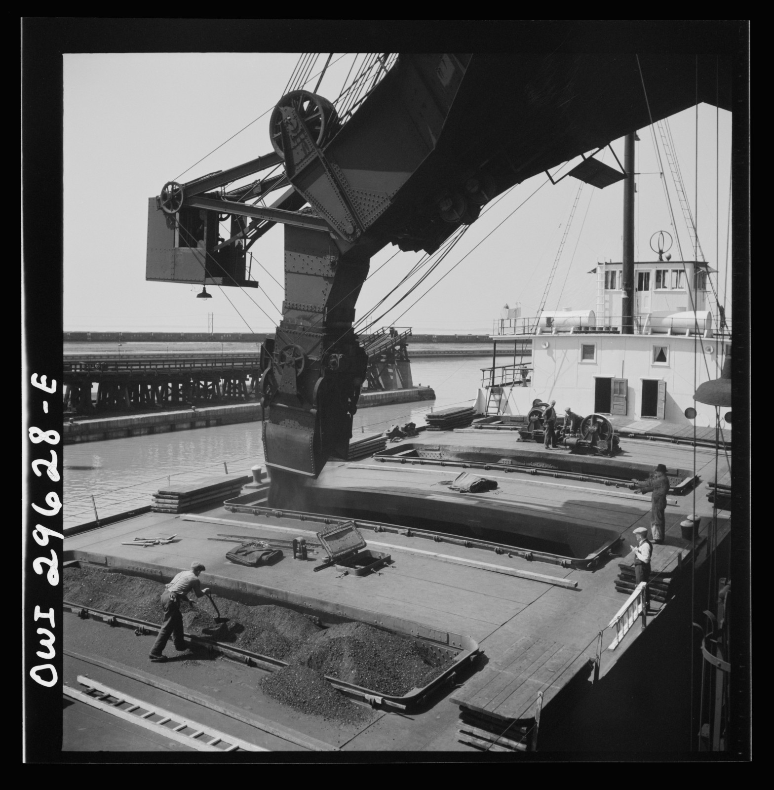 Coal is loaded onto a lake freighter at the Pennsylvania Railroad docks in Sandusky, Ohio in May, 1943. Photo Credit: Jack Delano / Library of Congress, Prints & Photographs Division, FSA/OWI Collection [LC-DIG-fsa-8d29908]