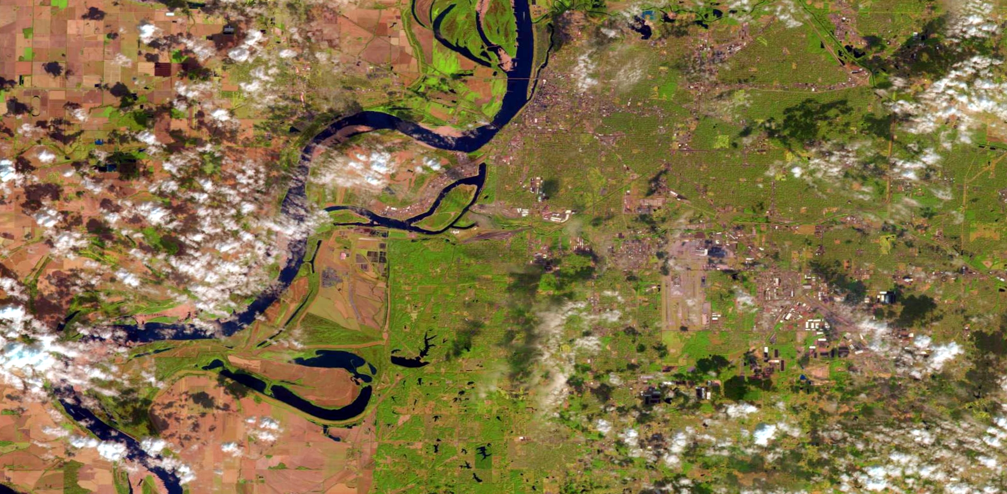 The Sparta-Memphis Sand Aquifer lies beneath Mississippi and Tennessee, land east of the Mississippi River that is shown in this Landsat image. Mississippi's lawsuit against Tennessee is the first lawsuit over a shared aquifer to be heard by the U.S. Supreme Court.