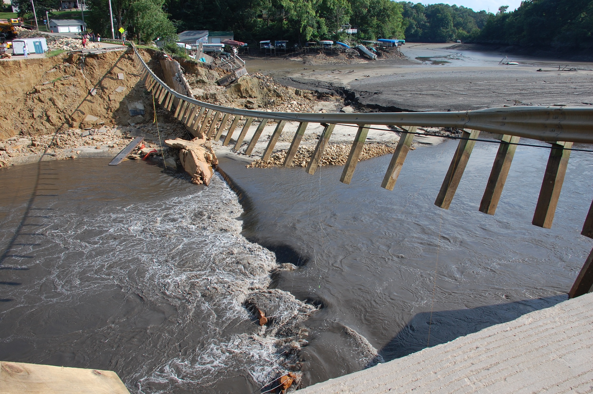 The remains of the Lake Delhi Dam, in Iowa, after the 59-foot-high structure failed during a heavy rainstorm in July 2010. Photo by Josh deBerge / FEMA