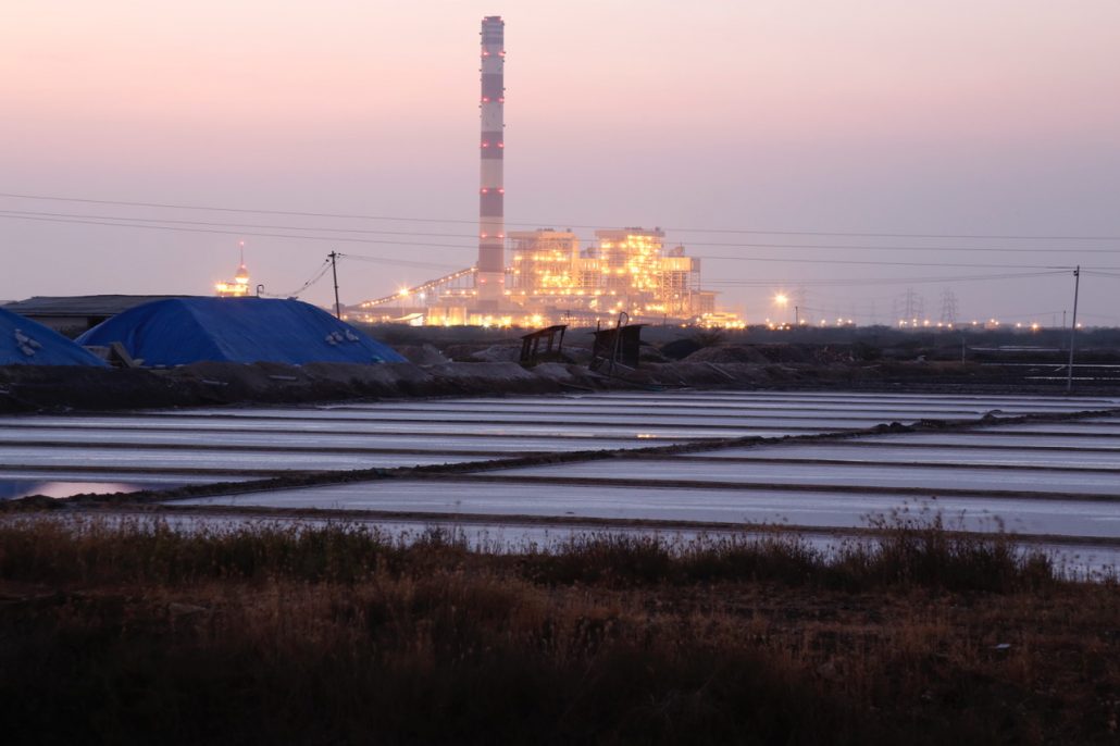 Coal-fired power plants still dominate Tamil Nadu's electrical supply grid. Here a sea water-cooled power plant, framed by salt-making evaporation ponds, along the Bay of Bengal in Tuticorin. Photo/Dhruv Malhotra