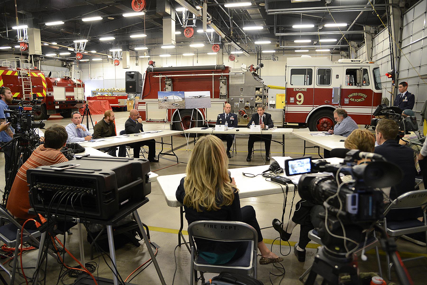 Air Force officials answer questions from local media at Fire Station One during a roundtable at Peterson Air Force Base, Colorado, on November 2, 2016. The officials were visiting Peterson AFB to discuss perfluorinated compound contamination in the aquifer that Fountain, Security, and Widefield use for drinking water. Photo by U.S. Air Force / Rob Bussard